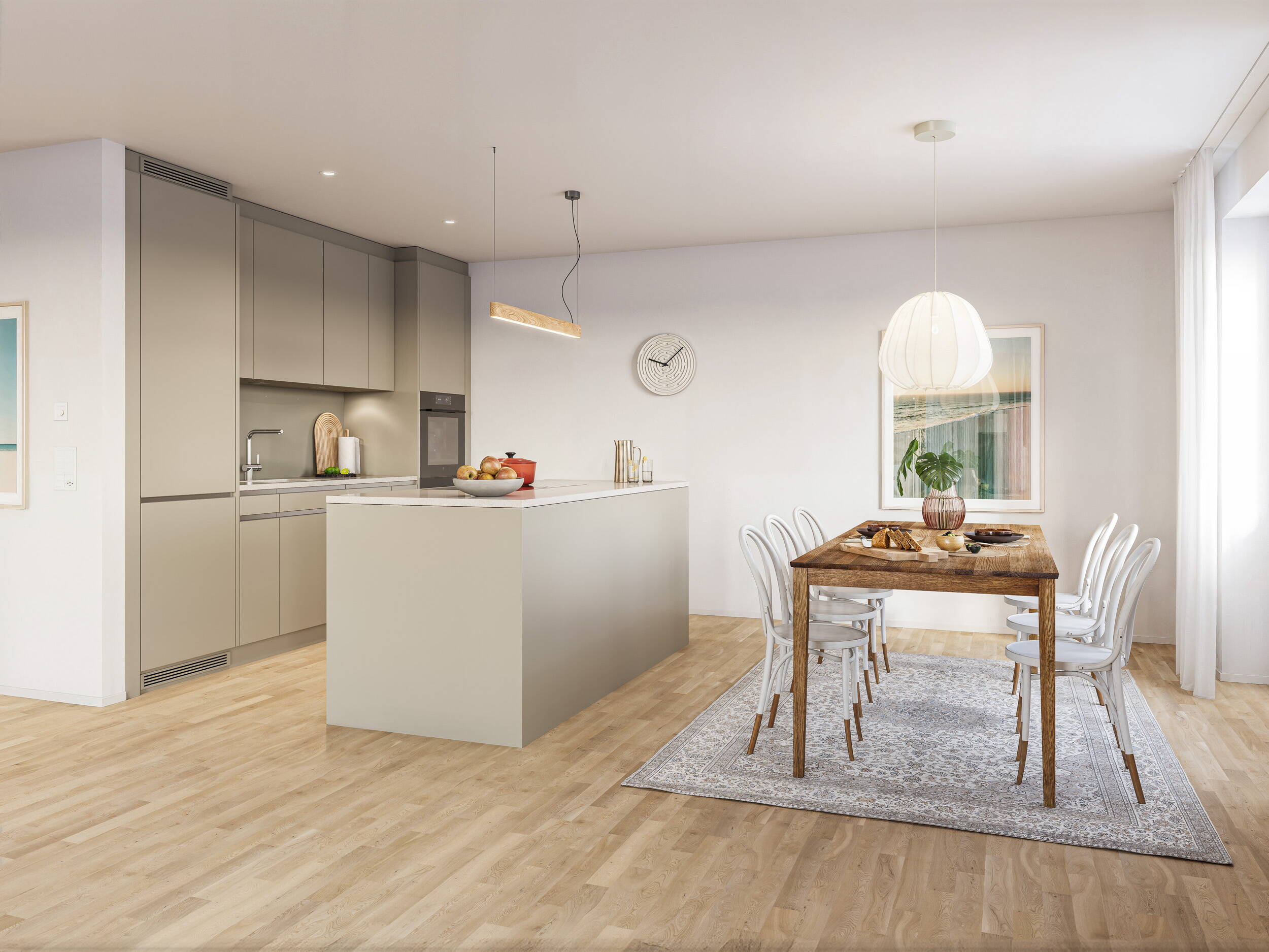 Offene Küche der Ausbauvariante Aurea mit klarer Linienführung und harmonischer Materialisierung.