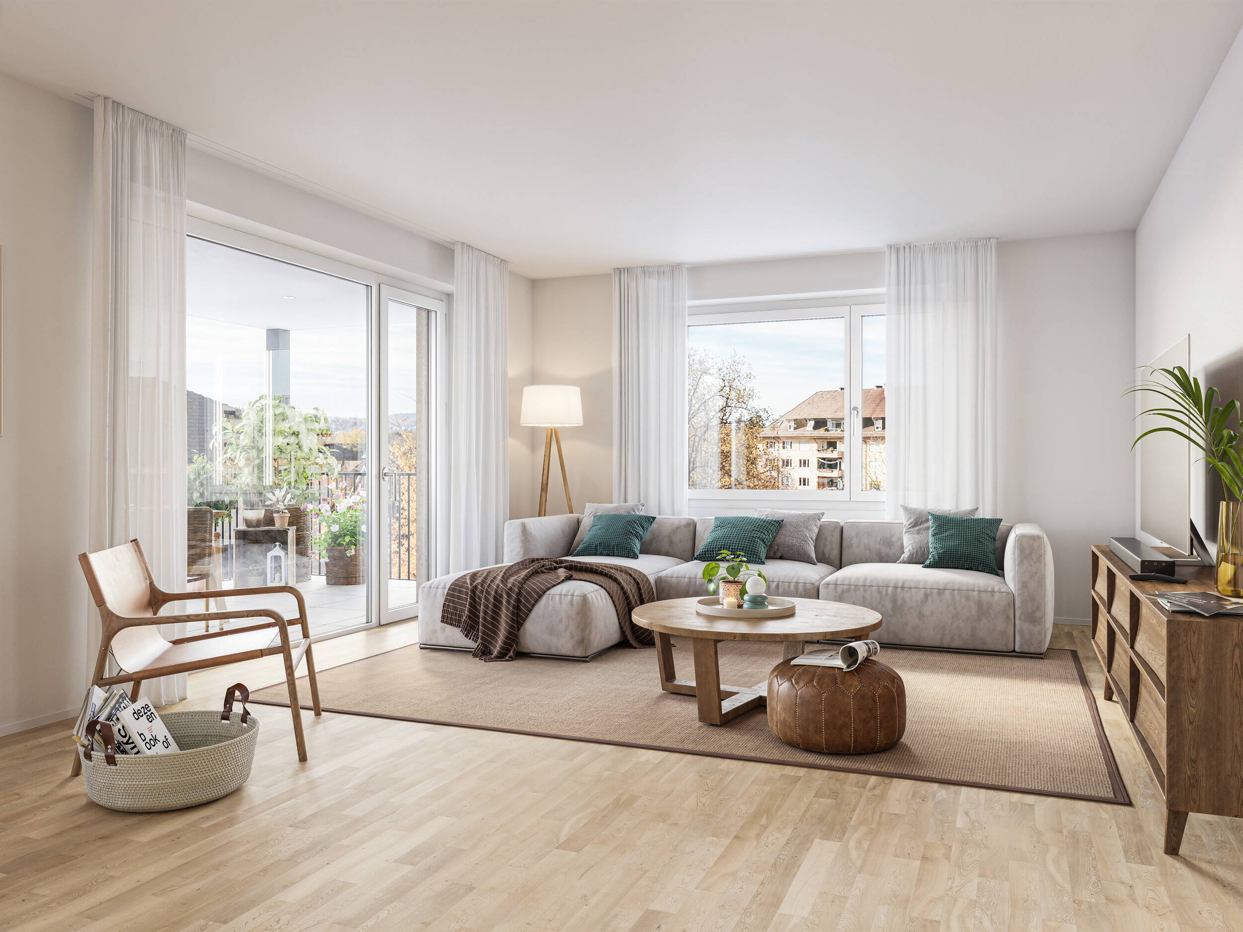 Heller Wohnbereich der Ausbauvariante Aurea mit grosszügigen Fensterflächen und Zugang zum Aussenraum.